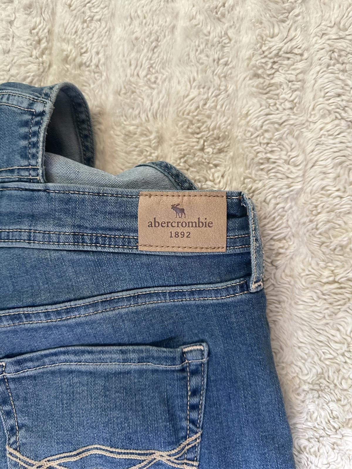 Abercrombie Kids medium wash distressed bib-style denim overalls Size 15/16