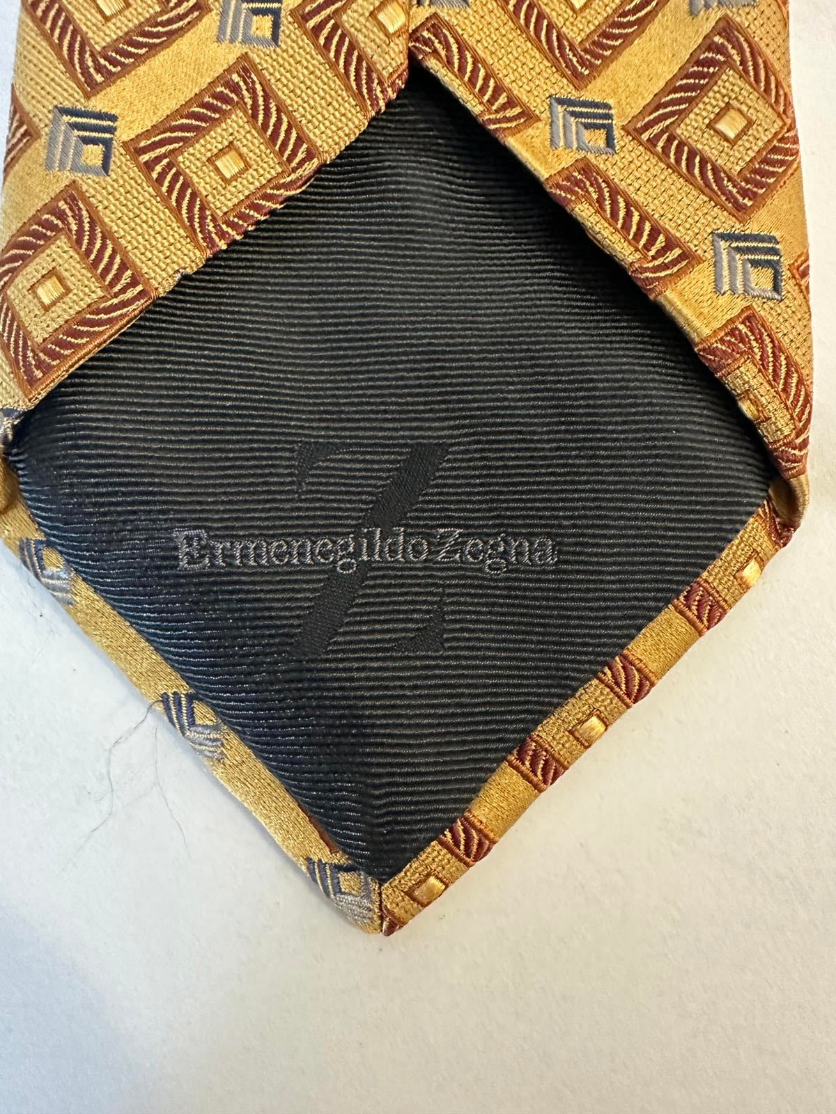 Ermenegildo Zegna classic quiet luxury tan/gold/grey geometric silk neck tie