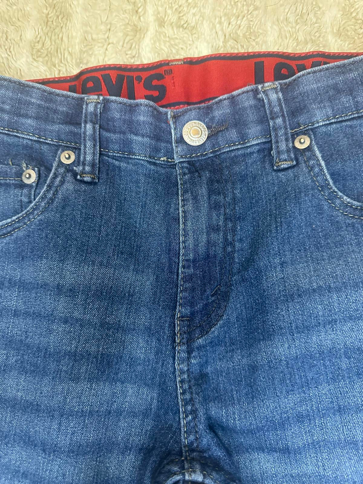 Levi's 511 jeans (27x29) denim medium wash slim fit classic vintage-inspired