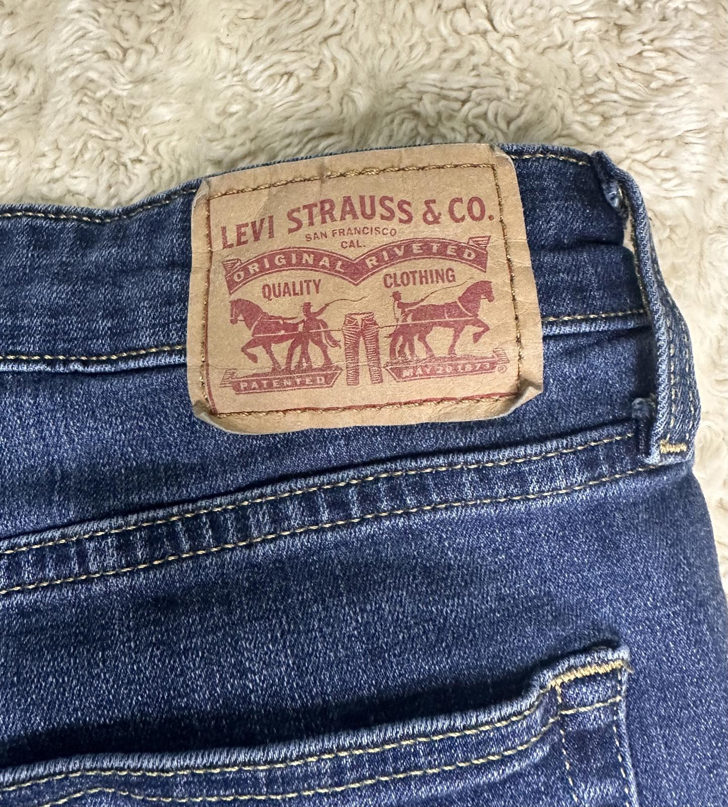 Levi's 721 High Rise Skinny modern classic medium wash denim jeans W31 L30