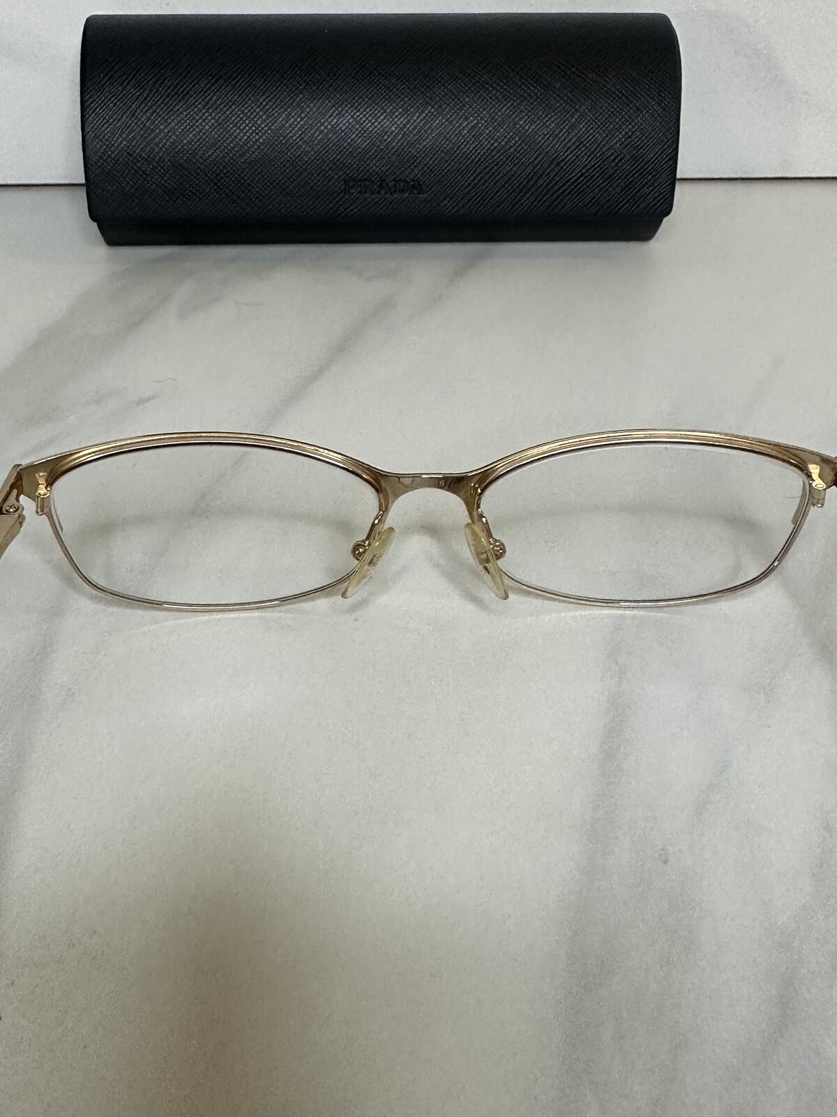 Prada VPR 03R gold tone cat-eye eyeglasses 55-16-135