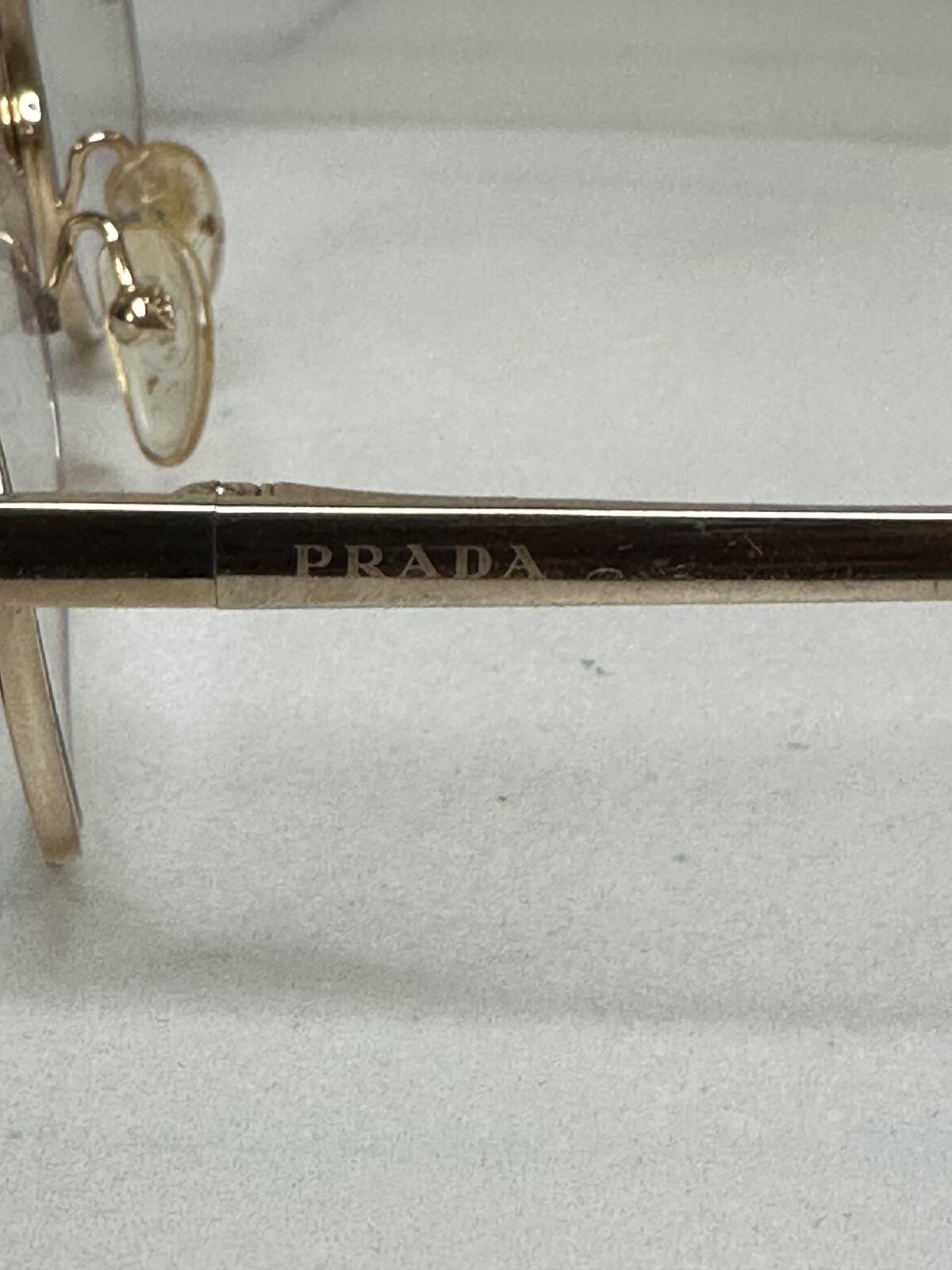 Prada VPR 03R gold tone cat-eye eyeglasses 55-16-135
