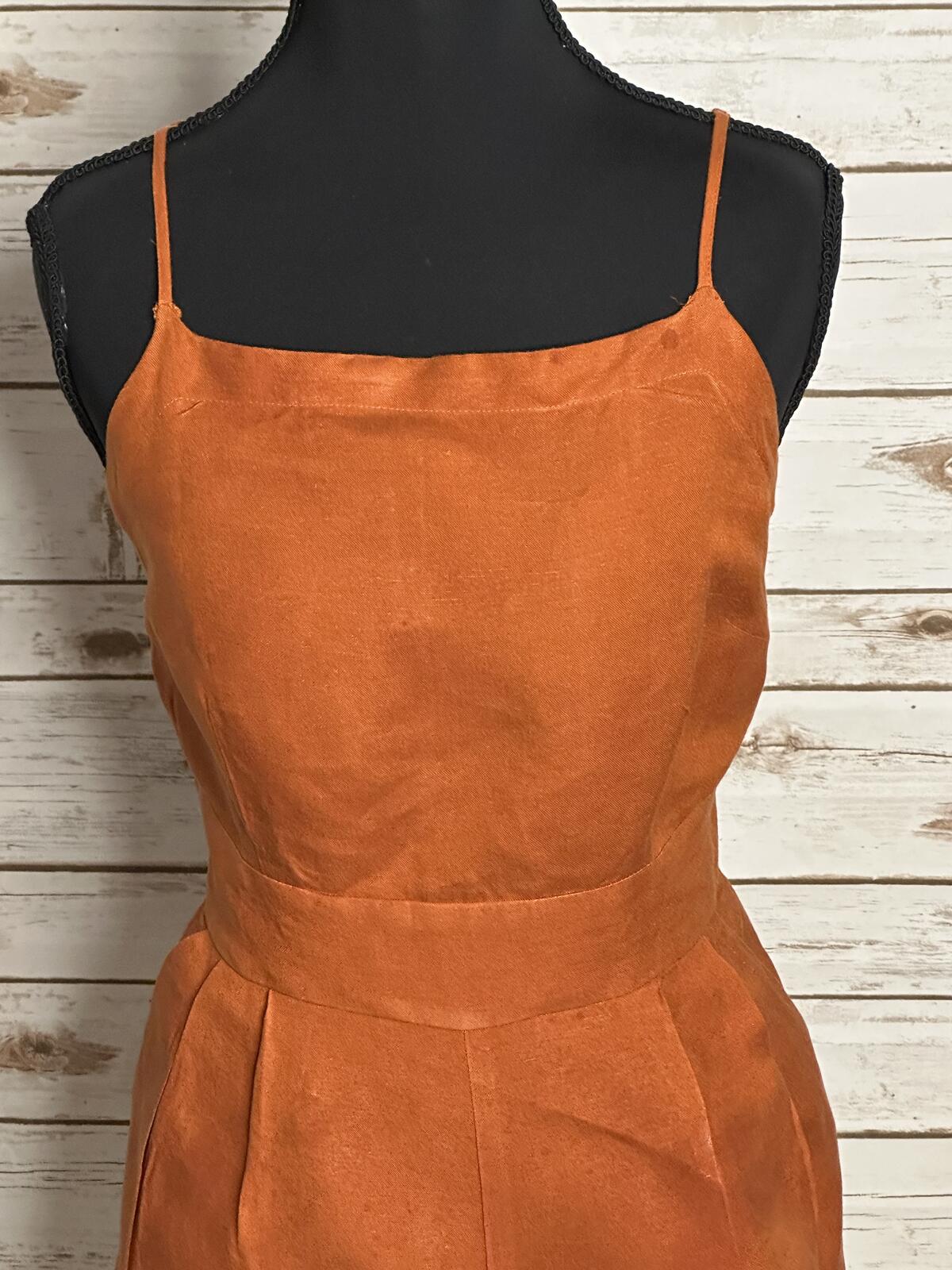 LOFT sleeveless ruffled hem romper Size 4 linen-blend rust coastal summer