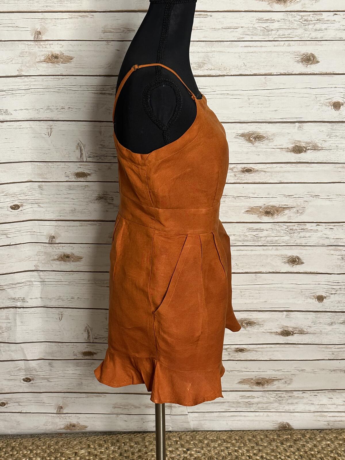 LOFT sleeveless ruffled hem romper Size 4 linen-blend rust coastal summer