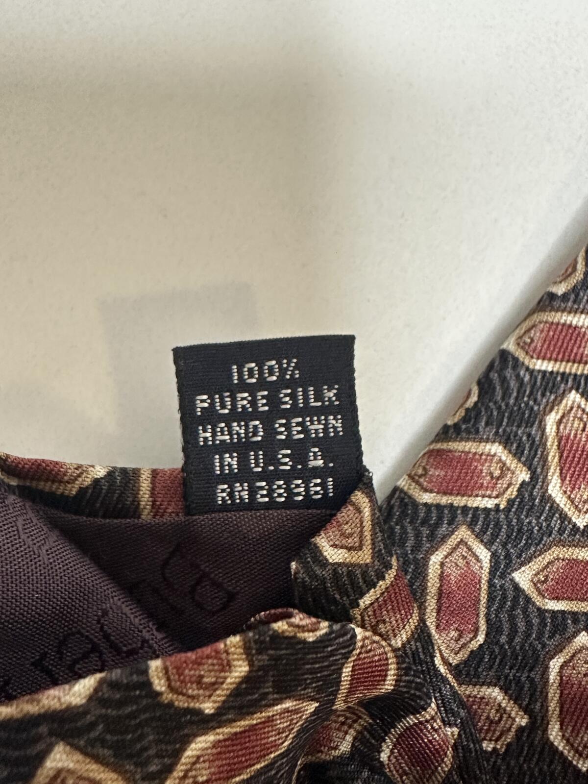 Vintage Burberrys London silk tie black/brown/gold geometric medallion classic
